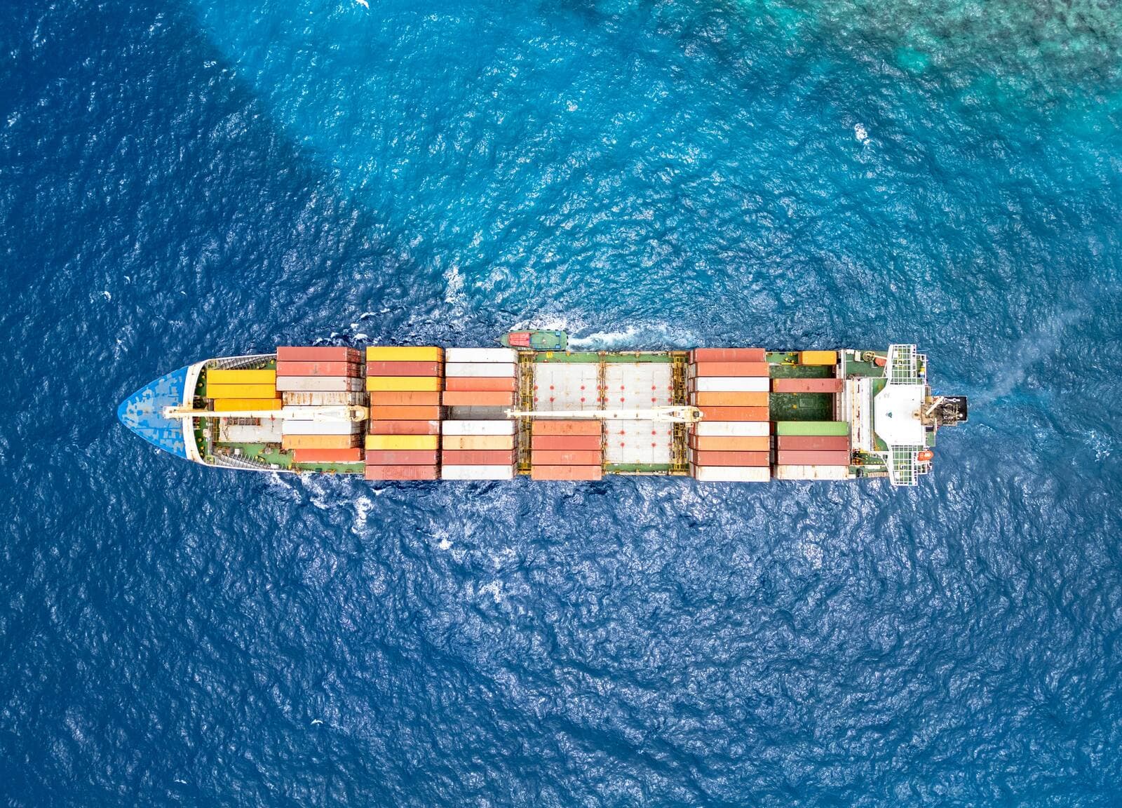 A container vessel travelling through the open ocean